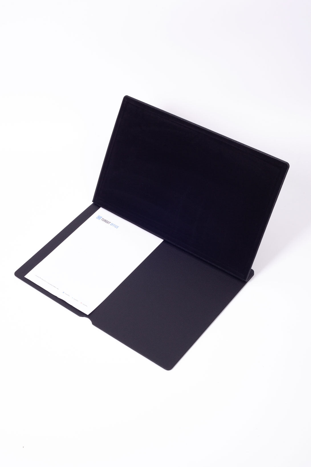 مكتب مغطى بالجلد، تفاصيل خشبية سوداء، مقاس 50 × 35 سم.